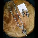 SilverlookalikePeacockdesignedRubyandPearlNecklaceset-FashionJewels3.webp