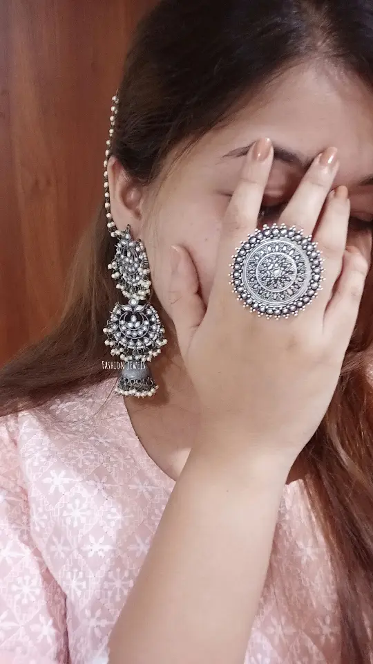 StatementLayeredBlackmetalkundanJhumka-FashionJewels3.webp