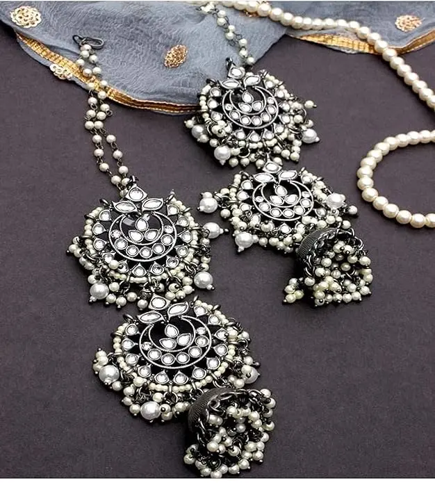 StatementLayeredBlackmetalkundanJhumka-FashionJewels2.webp