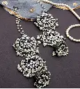 StatementLayeredBlackmetalkundanJhumka-FashionJewels2.webp
