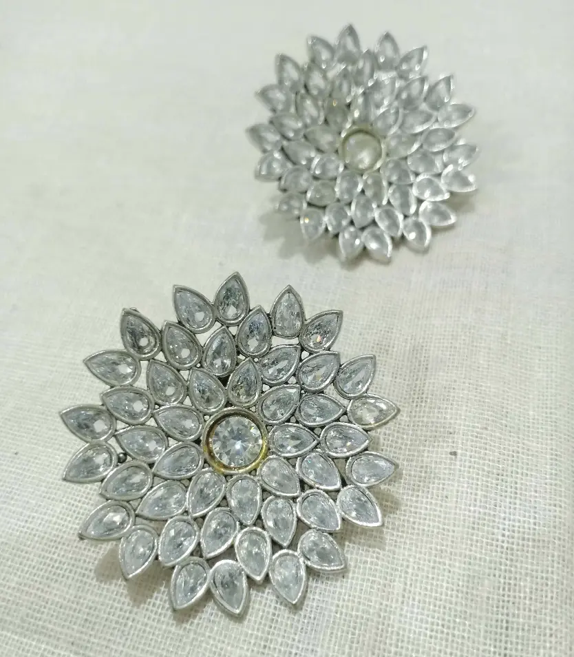 Amritazirconflowerstonestatementstuds-FashionJewels2.webp