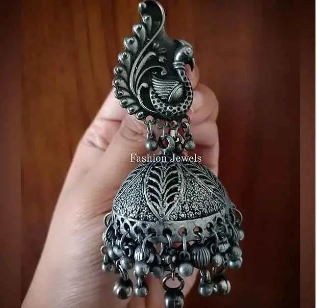 Silver intricate statement Peacock Jhumka