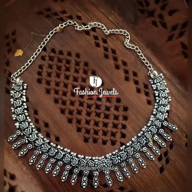 Silver oxidised lotus necklace