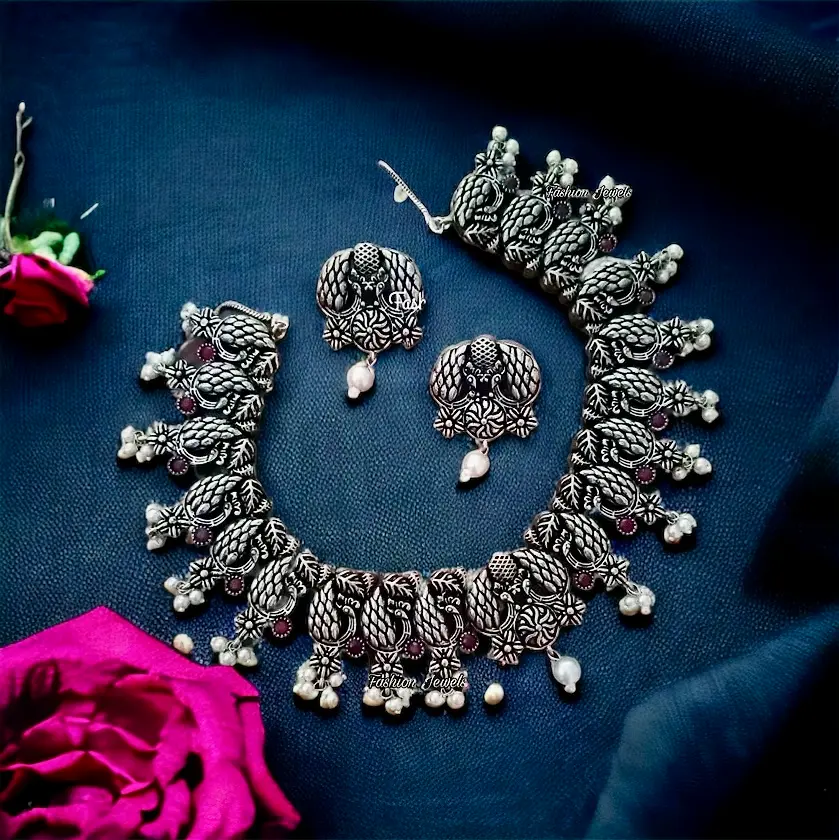 Silver peacock designed ruby pearl Necklace set