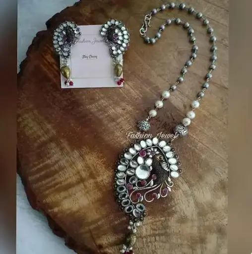 Dualtone peacock designed pendant necklace